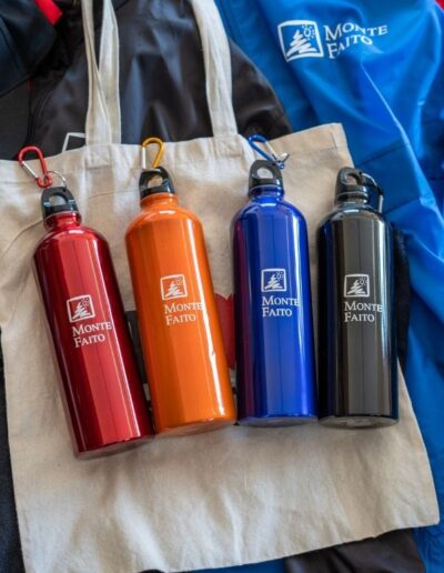 colored water bottles and bag